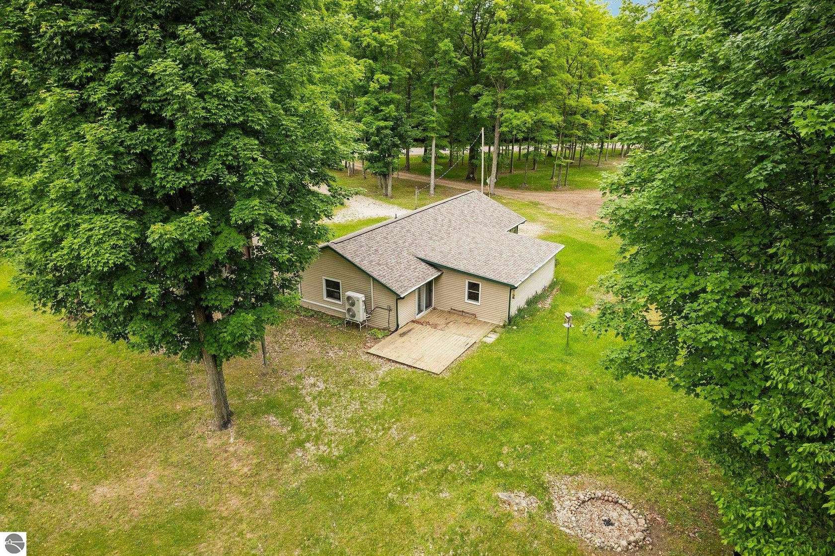 10 Acres of Recreational Land with Home for Sale in Fife Lake, Michigan