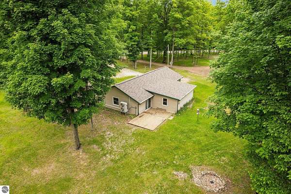 10 Acres of Recreational Land with Home for Sale in Fife Lake, Michigan