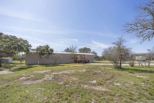 6 Acres of Residential Land with Home for Sale in Blanco, Texas