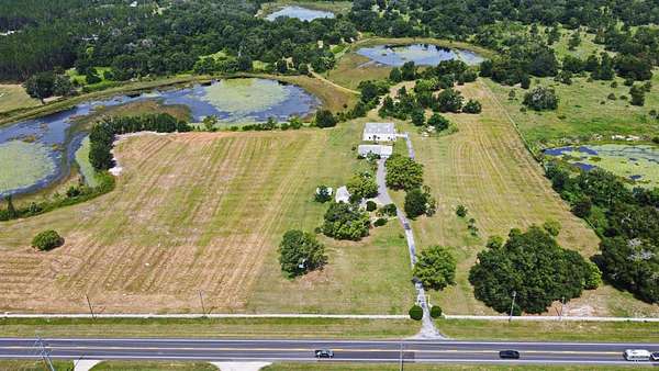 73 Acres of Agricultural Land with Home for Sale in Howey-in-the-Hills, Florida