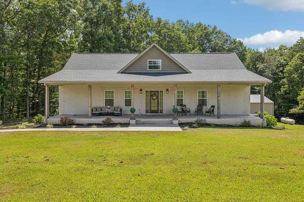 9.17 Acres of Residential Land with Home for Sale in Red Boiling Springs, Tennessee