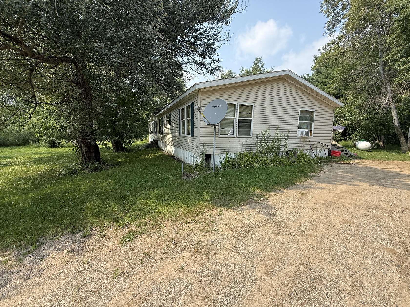 10 Acres of Residential Land with Home for Sale in Morley, Michigan