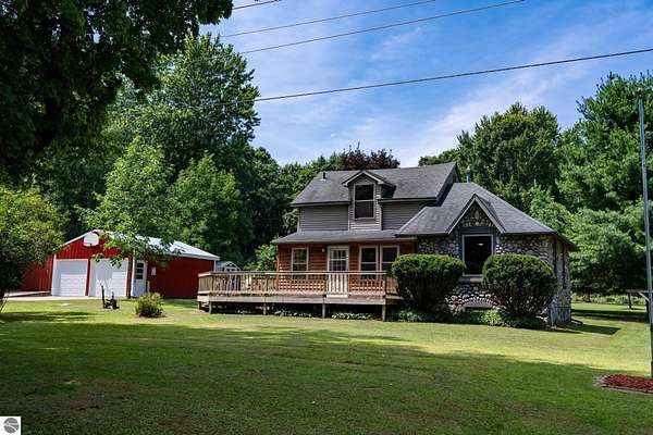 5 Acres of Residential Land with Home for Sale in Weidman, Michigan