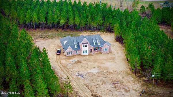 3.63 Acres of Residential Land with Home for Sale in Brandon, Mississippi