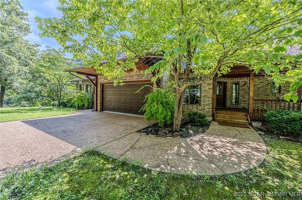 187 Acres of Recreational Land with Home for Sale in Barnett, Missouri