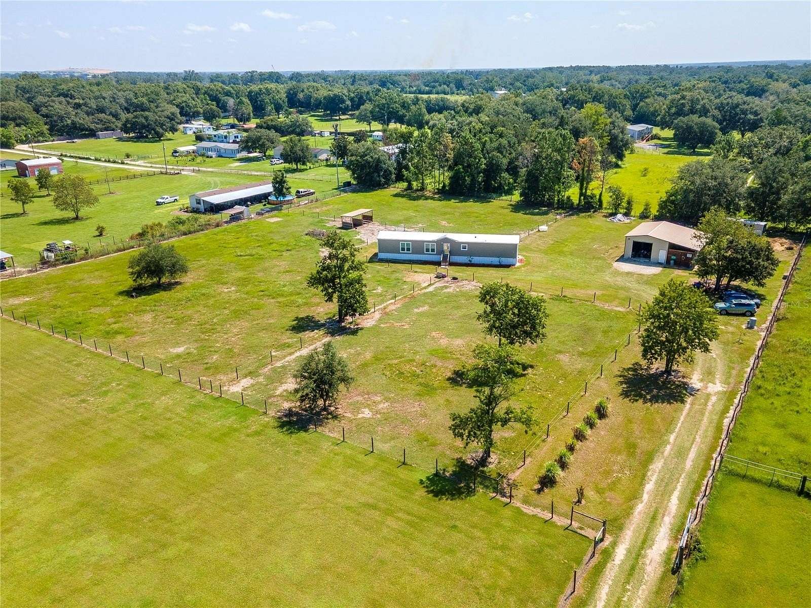 2.45 Acres of Residential Land with Home for Sale in Zephyrhills, Florida