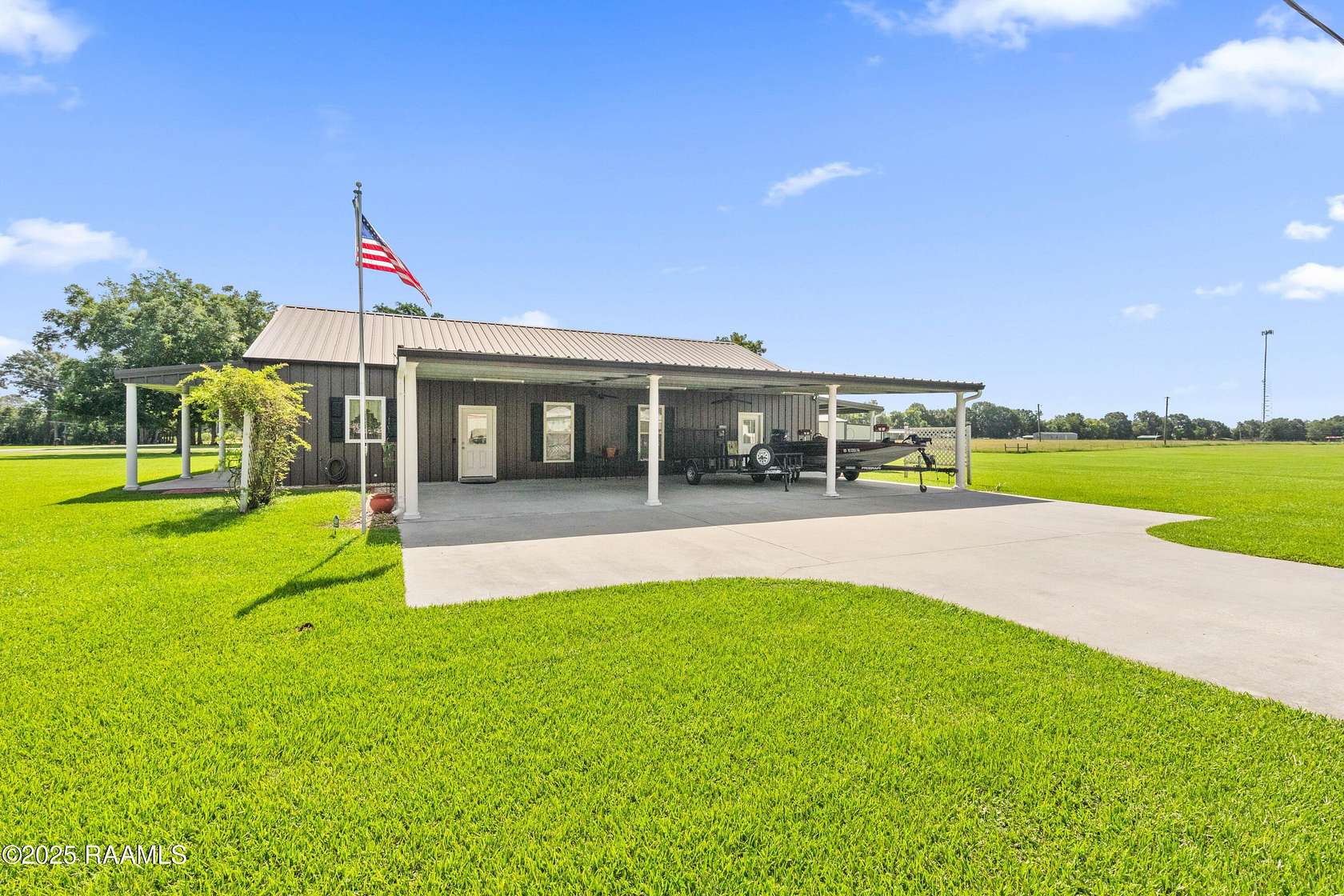 7.1 Acres of Residential Land with Home for Sale in Youngsville, Louisiana