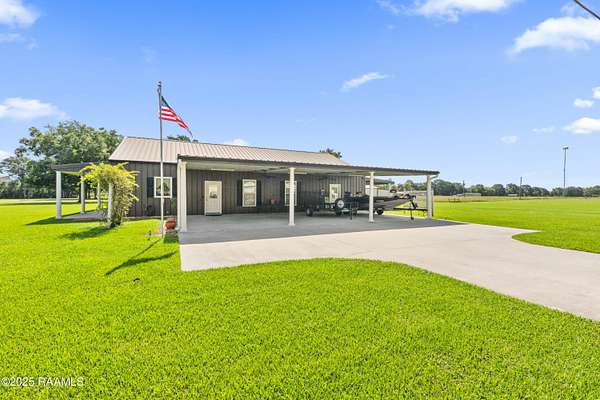 7.1 Acres of Residential Land with Home for Sale in Youngsville, Louisiana