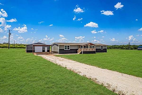 2 Acres of Residential Land with Home for Sale in Bellevue, Texas