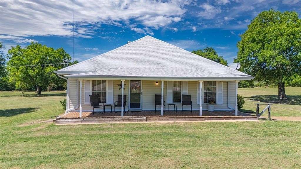 2 Acres of Residential Land with Home for Sale in Honey Grove, Texas