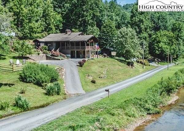 2.8 Acres of Residential Land with Home for Sale in Lansing, North Carolina