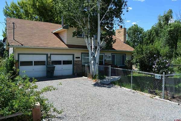 1.5 Acres of Residential Land with Home for Sale in Delta, Colorado