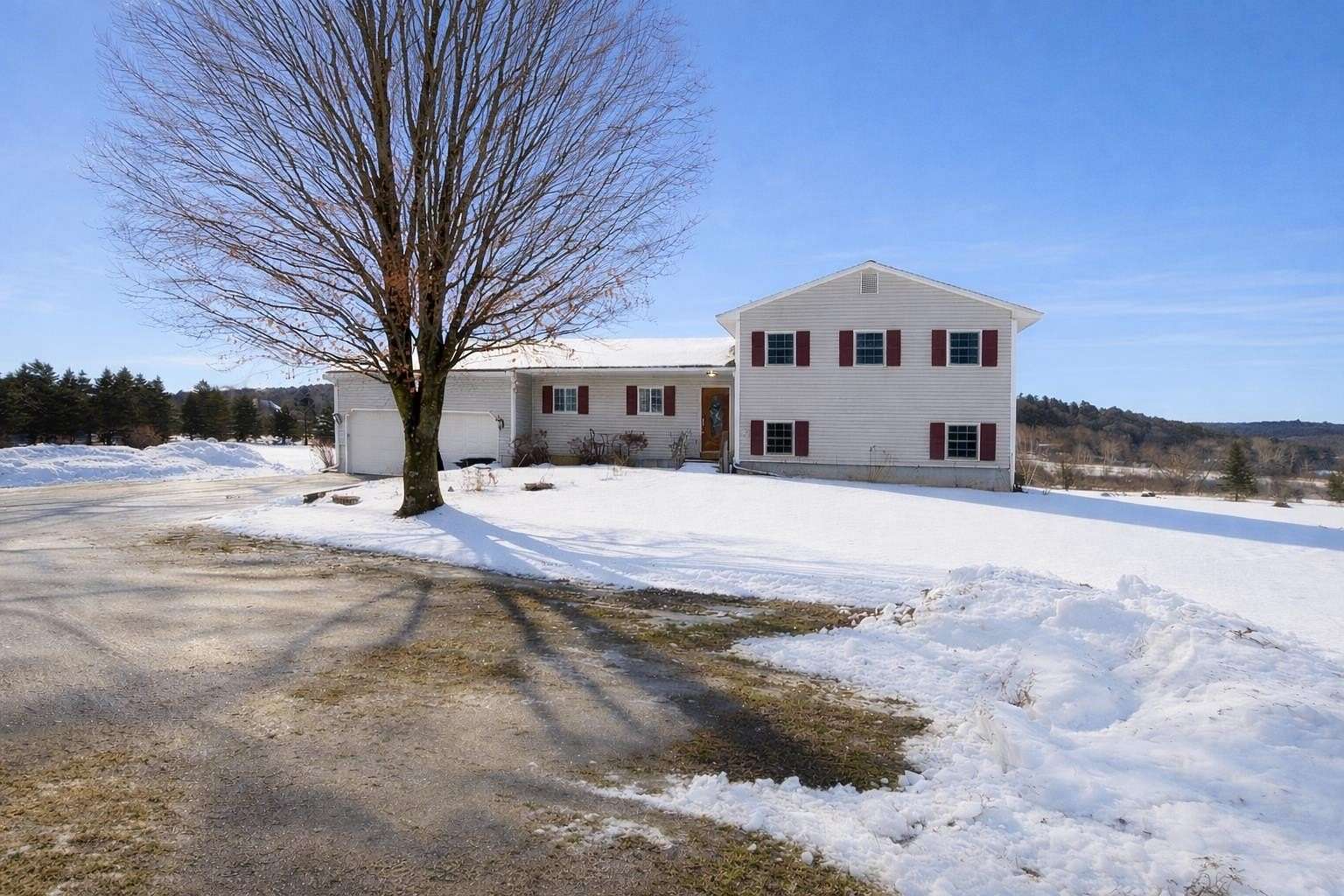 10.6 Acres of Land with Home for Sale in Fairfax, Vermont