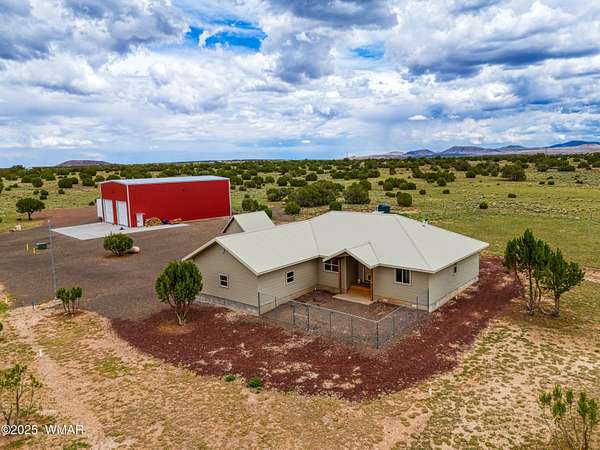 7.47 Acres of Land with Home for Sale in Concho, Arizona