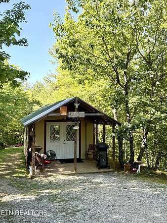 24.2 Acres of Recreational Land with Home for Sale in Vonore, Tennessee