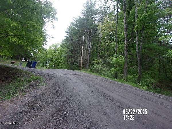 5.44 Acres of Residential Land with Home for Auction in Hampton, New York