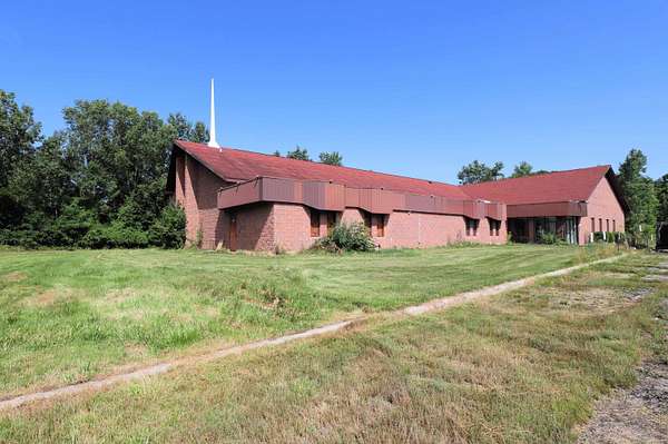 12.3 Acres of Improved Commercial Land for Sale in Flint, Michigan