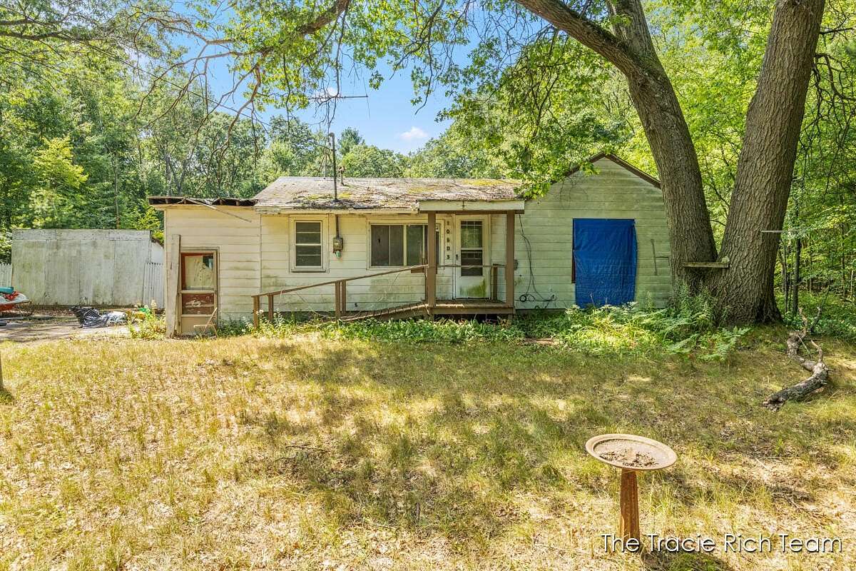 2.5 Acres of Residential Land with Home for Sale in Grant, Michigan