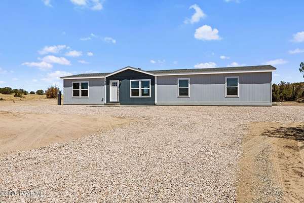 2 Acres of Residential Land with Home for Sale in Paulden, Arizona