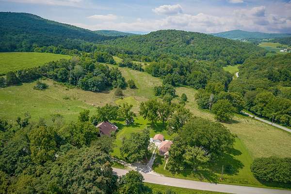 70 Acres of Agricultural Land with Home for Sale in Sparta, Tennessee