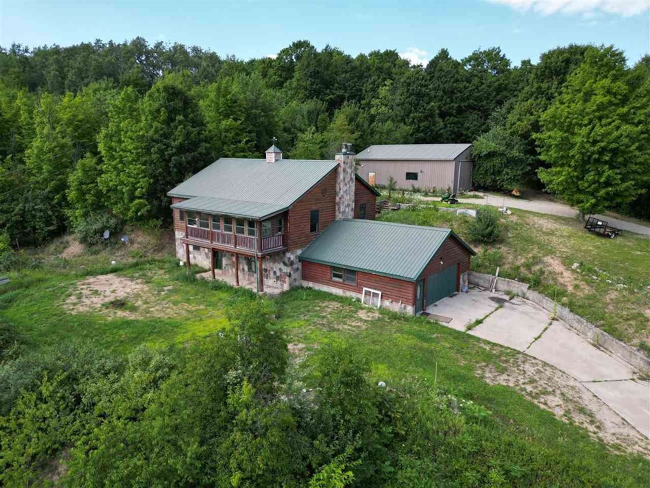 13 Acres of Land with Home for Sale in East Jordan, Michigan