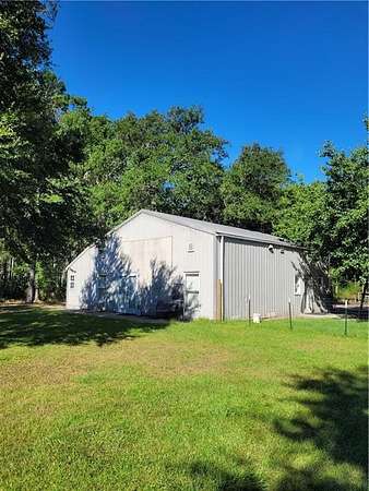 20.1 Acres of Land with Home for Sale in Townsend, Georgia