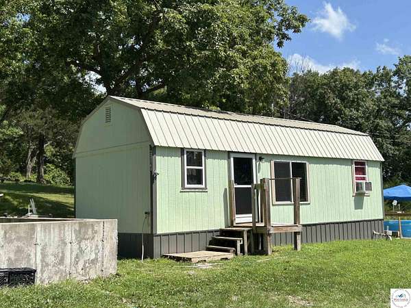 1.1 Acres of Residential Land with Home for Sale in Warsaw, Missouri