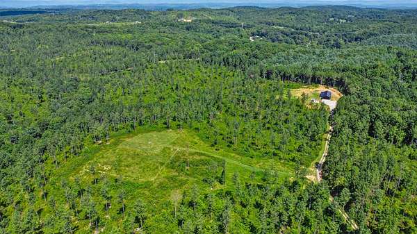 61.9 Acres of Land with Home for Sale in Ten Mile, Tennessee