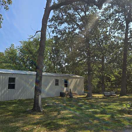 3.1 Acres of Residential Land with Home for Sale in Ash Grove, Missouri