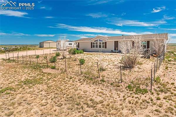 5.2 Acres of Residential Land with Home for Sale in Fountain, Colorado