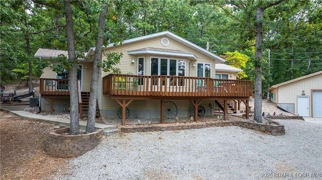 5.2 Acres of Residential Land with Home for Sale in Camdenton, Missouri