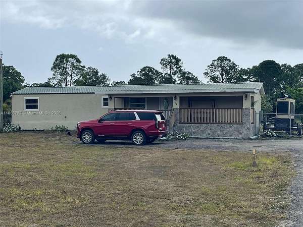 2.14 Acres of Residential Land with Home for Sale in Clewiston, Florida