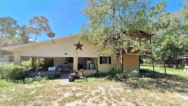 1.79 Acres of Residential Land with Home for Sale in Silver Springs, Florida