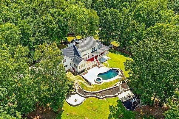 4.69 Acres of Land with Home for Sale in Ball Ground, Georgia