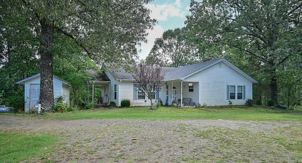 7 Acres of Land with Home for Sale in Mena, Arkansas