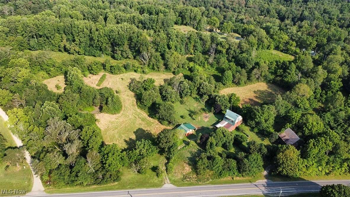 10.8 Acres of Land with Home for Auction in Lisbon, Ohio