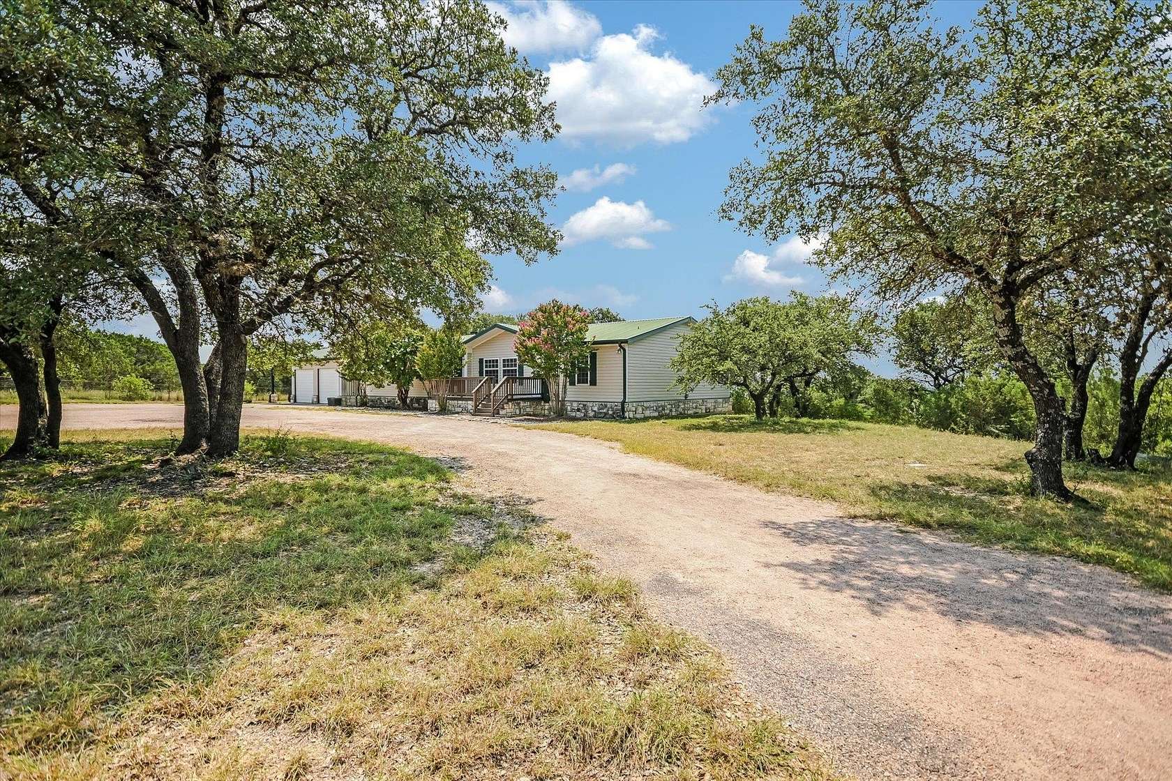 10 Acres of Land with Home for Sale in Marble Falls, Texas