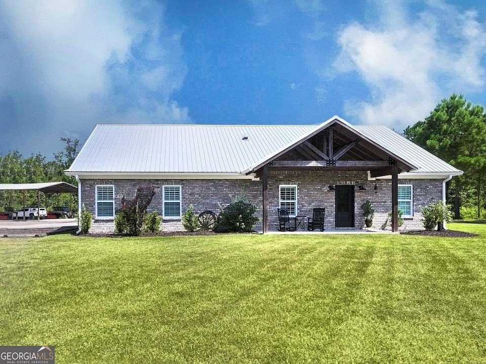 25 Acres of Land with Home for Sale in Kingsland, Georgia