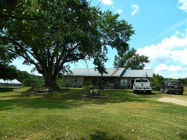 123 Acres of Agricultural Land with Home for Sale in Berryville, Arkansas