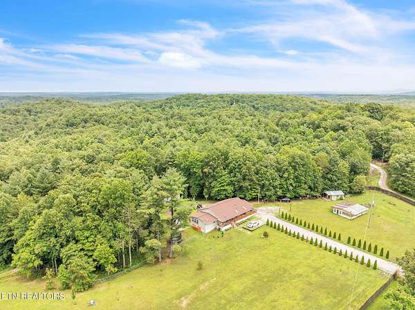 24.2 Acres of Agricultural Land with Home for Sale in Sunbright, Tennessee