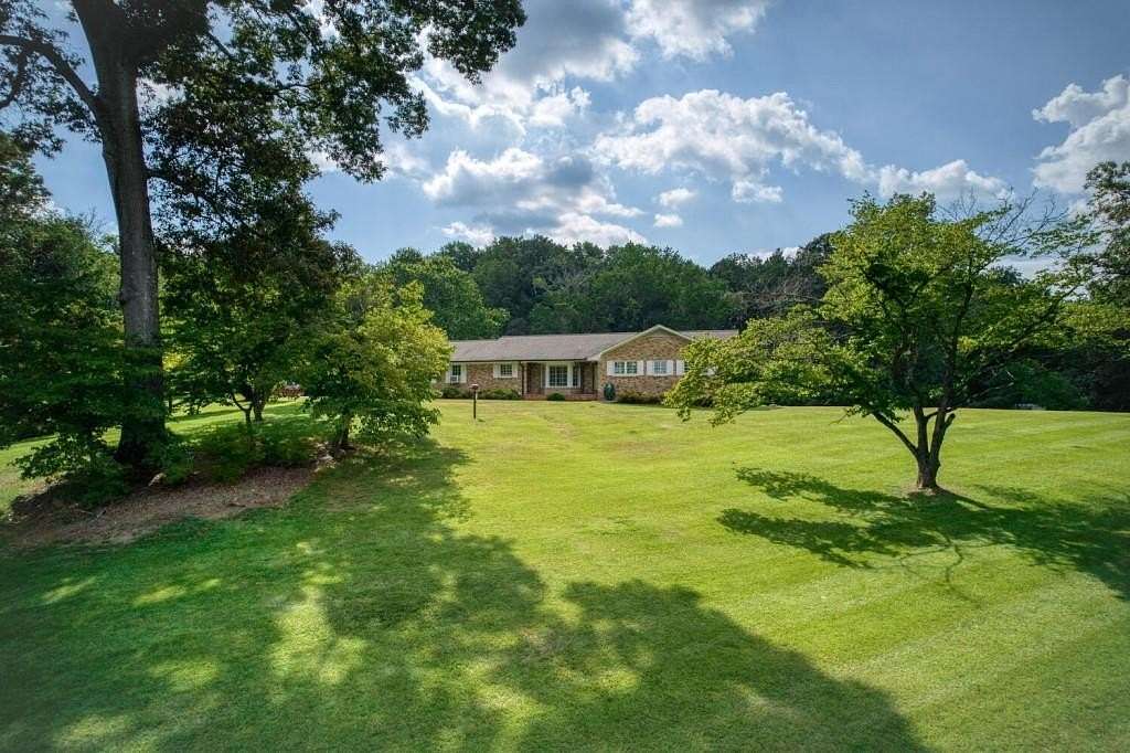 4.8 Acres of Residential Land with Home for Sale in Powder Springs, Georgia