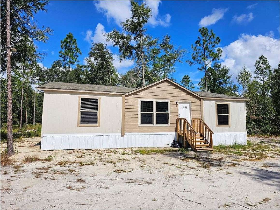 10 Acres of Residential Land with Home for Sale in Live Oak, Florida