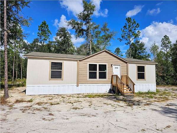 10 Acres of Residential Land with Home for Sale in Live Oak, Florida