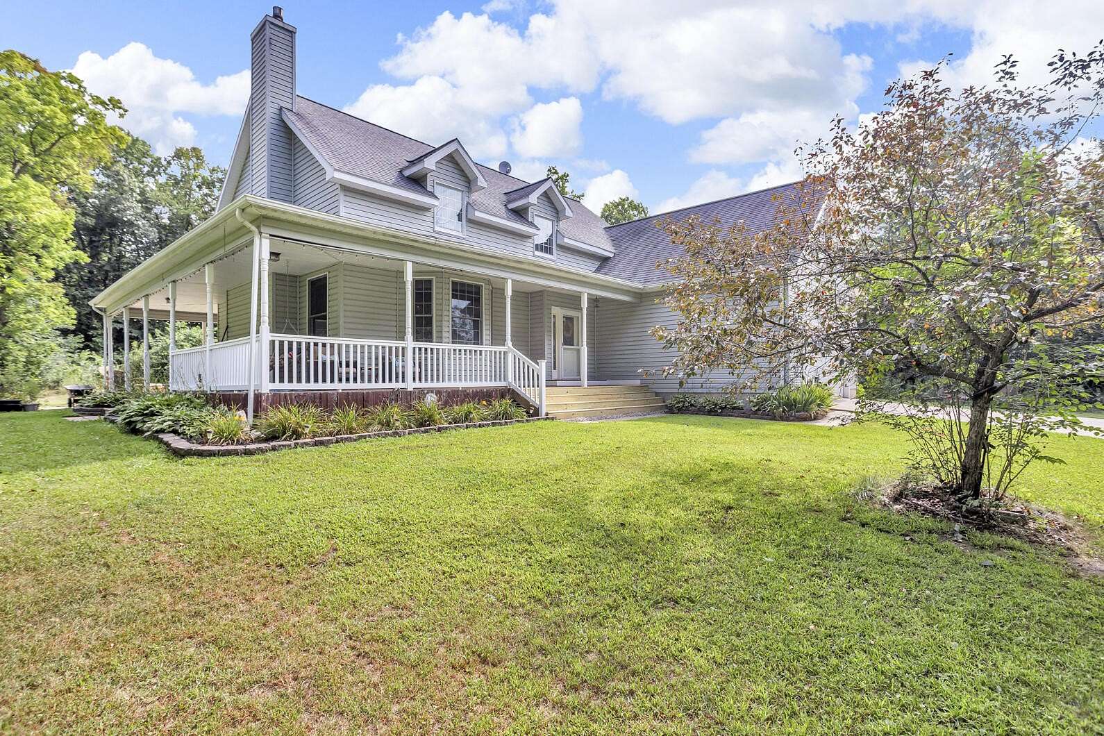 19 Acres of Recreational Land with Home for Sale in Cement City, Michigan