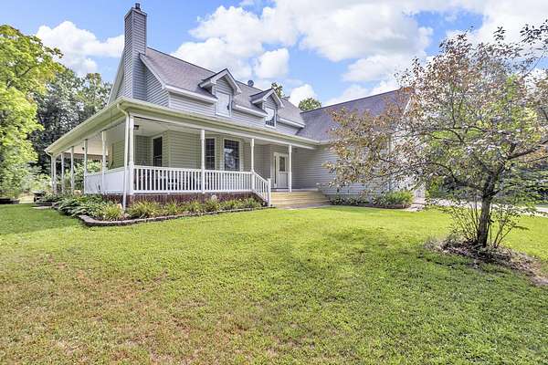 19 Acres of Recreational Land with Home for Sale in Cement City, Michigan