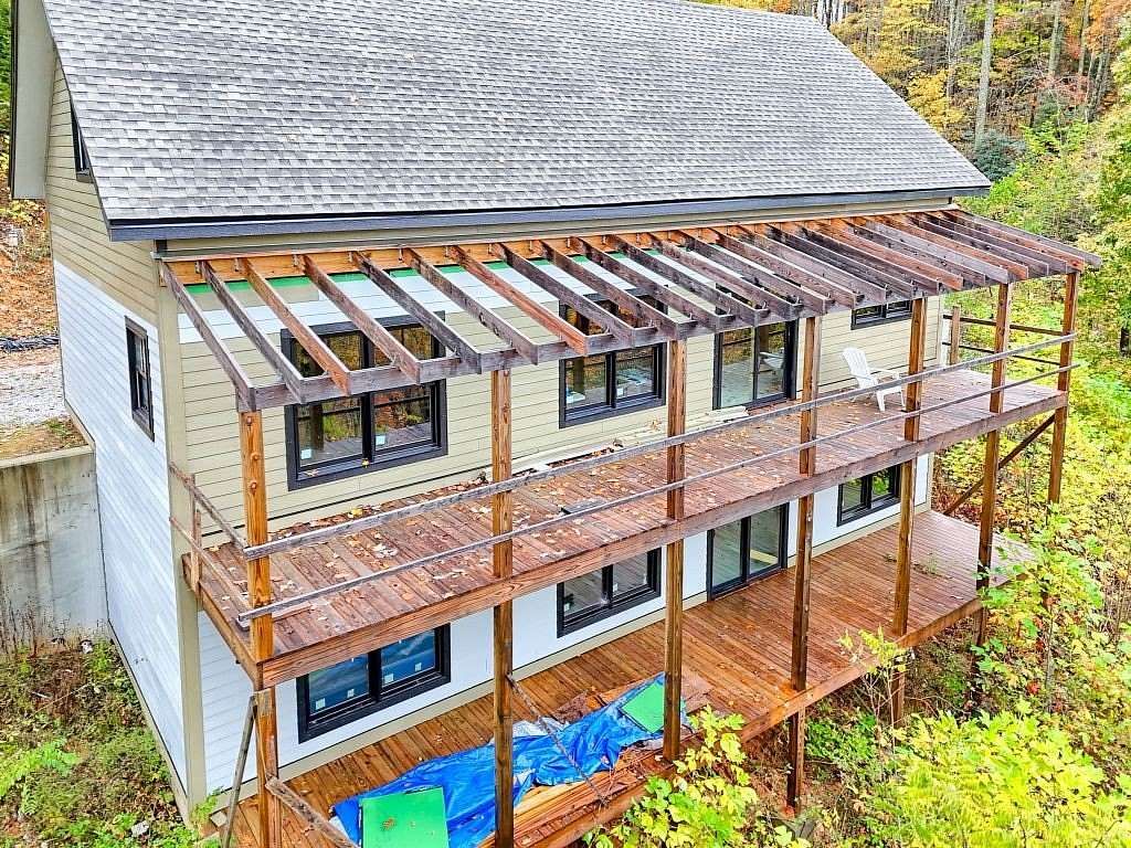 5 Acres of Residential Land with Home for Sale in Scaly Mountain, North Carolina