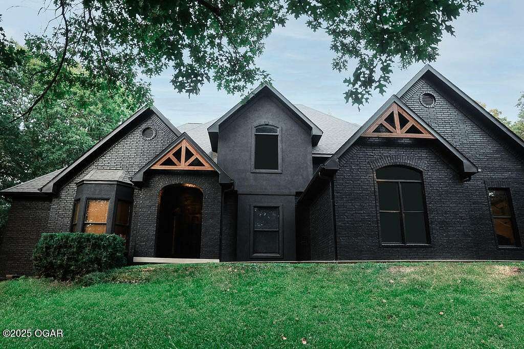 8 Acres of Residential Land with Home for Sale in Baxter Springs, Kansas