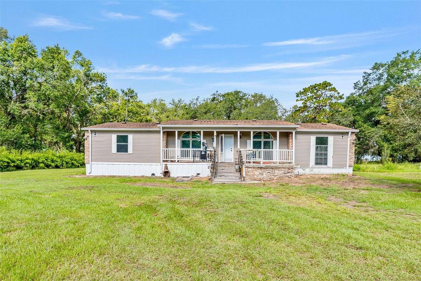 5 Acres of Land with Home for Sale in Lady Lake, Florida