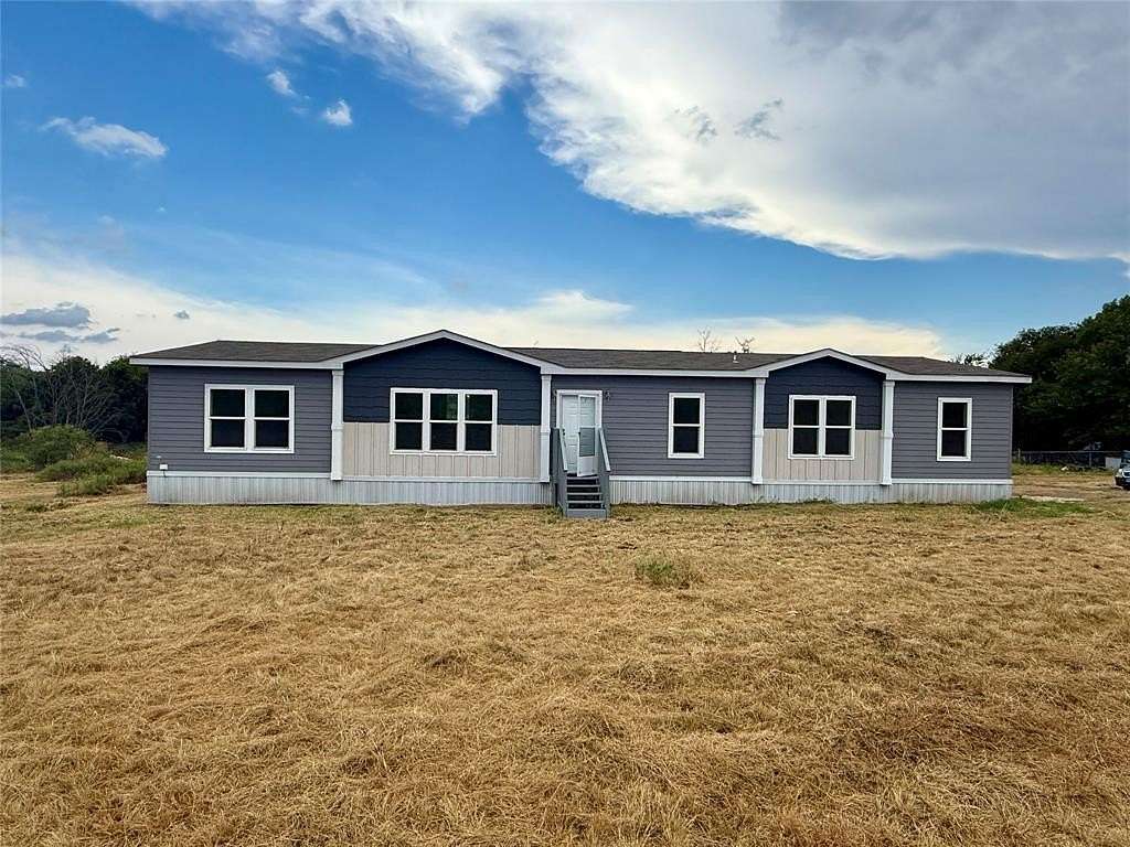 7.37 Acres of Residential Land with Home for Sale in Cresson, Texas