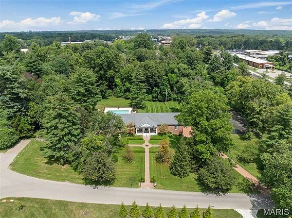 2.23 Acres of Residential Land with Home for Sale in Huntleigh, Missouri